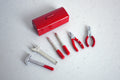 1:12 scale miniature metal tool box in red with tools, set of 7, hammer, wrench, pliers and screwdrivers laid out