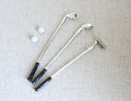 1:12 scale miniature golf clubs and balls, set of 5, three silver clubs with black grips and two white balls