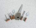 1:12 scale miniature hand tools with wood handles, set of 6, including saw and trowels, laid on linen
