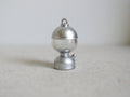 1:12 scale miniature metal camping lantern in silver with clear globe and top ring, shown on a white surface
