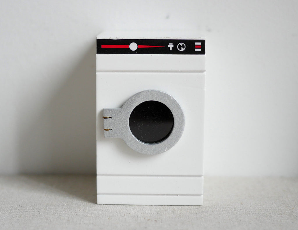 1:12 scale miniature wood front load washing machine in white with a swing door and black control panel
