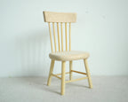 1:12 scale miniature unpainted wood spindle back dining chair with turned legs, shown on a white surface