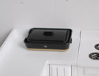 1:12 scale miniature black rectangular electric skillet with lid, shown on a white kitchen counter