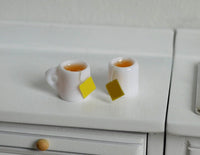 1:12 scale Dollhouse Miniature Cup of tea 2 white cups English tea yellow label tea E083