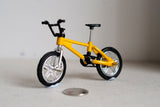 Dollhouse outdoor decoration miniature small size freestyle bike 1:12 scale cross bicycle front and rear pegs no brakes (Yellow) B008