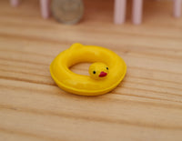 Dollhouse miniature Pool Float, swimming inflatable, yellow duck tube (in hard plastic) - H033