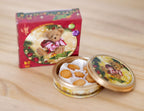 1:12 scale miniature gold butter cookie tin with box and 6 cookies, teddy bear print lid, on a wood table