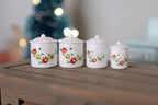 1:12 scale miniature floral kitchen canister set with lids in white with red flowers, set of 4 graduated sizes