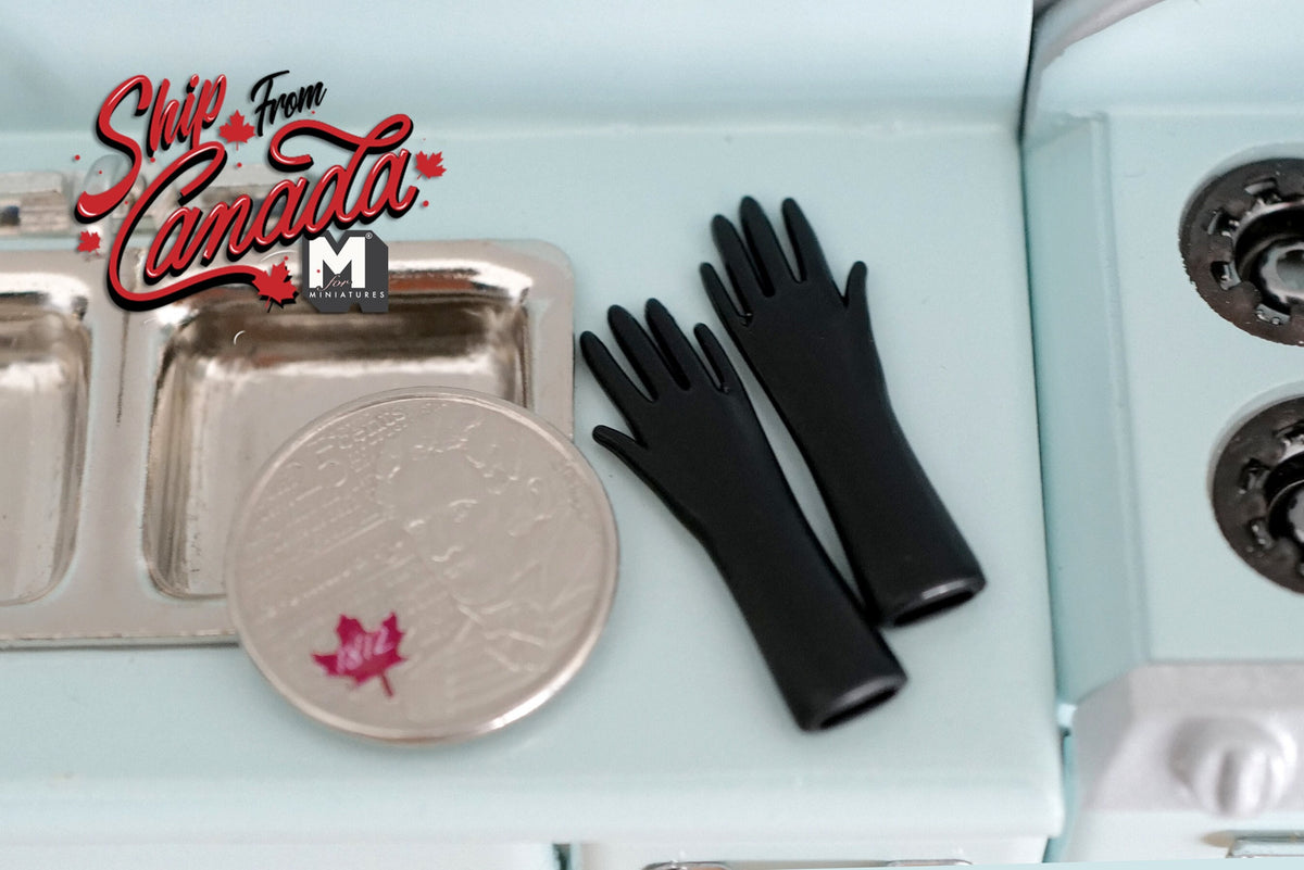 1:12 scale miniature black dish washing gloves, 1 pair, shown on a kitchen counter beside a sink and a coin for scale