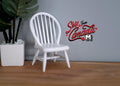 1:12 scale miniature white wood Windsor bow back dining chair with spindles, shown beside a potted plant