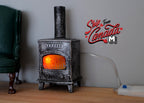 1:12 scale miniature wood burning stove fireplace in gray with glowing orange LED fire light and flue pipe