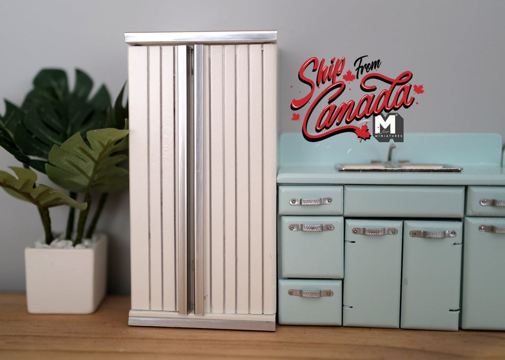 1:12 scale miniature white wood side by side refrigerator with 2 doors and 8 shelves, shown beside a kitchen sink unit