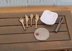 1:12 scale miniature wood and metal cooking utensils with a white bowl, set of 6, on a wood table beside a coin