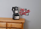 1:12 scale miniature black upright dial telephone, vintage pay phone style, shown on a wood dresser