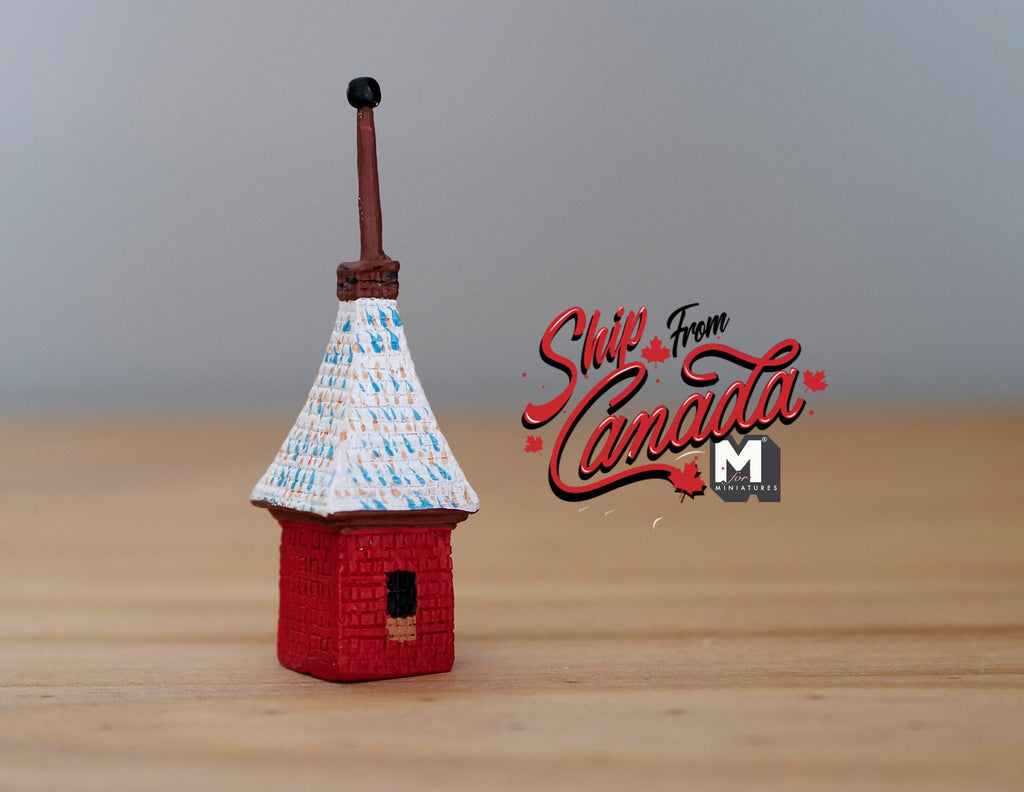 1:12 scale miniature red Irish cottage birdhouse with white and blue thatched style roof and tall finial