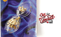 1:12 scale miniature brass keyhole plates with keys and nails, set of 6, shown in clear blister packaging