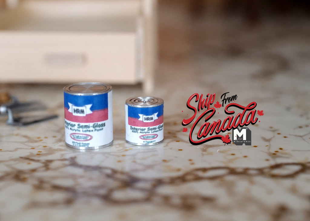 1:12 scale miniature metal paint cans with printed labels, set of 2, shown on a paint splattered floor