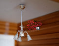 1:12 scale miniature silver LED 3 arm tulip chandelier with frosted glass shades and on/off switch, hanging from a ceiling