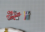 1:12 scale miniature toothbrush cup with colorful toothbrushes and toothpaste, 5 pieces, shown on a gray tile wall