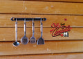 1:12 scale miniature metal kitchen utensils with wall rail, set of 5, ladle, skimmer and turners hanging on a wood wall