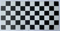 1:12 scale miniature black and white checkered floor tile sheet, 6 x 12 tiles, full sheet viewed from above