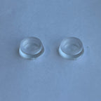 1:12 scale miniature small clear pet food bowls, set of 2, round with wide bases, shown on a blue surface