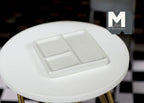1:12 scale miniature clear square divided plate with compartments, sold as 1 plate, shown stacked on a round white table
