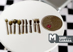 1:12 scale miniature metal tableware with serving ladles in gold, set of 9, shown beside a coin on a white table