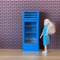 1:12 scale miniature column beverage cooler in blue with glass door and 4 shelves, shown beside a doll for scale