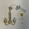 1:12 scale miniature brass globe chandelier with 2 arms and clear glass globes, 12V LED, shown with plug and parts