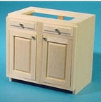 1:12 scale miniature wood kitchen base cabinet kit with 2 doors, shown assembled and unpainted on a blue background