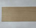 Miniature oak wood sheet for flooring and walls, pale fine grain plank shown flat on a white surface