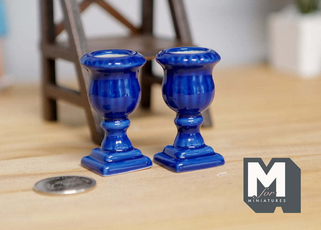 1:12 scale miniature Roman style pedestal urn planters in glossy cobalt blue, set of 2, shown beside a coin for scale