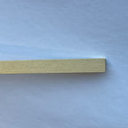 1:12 scale miniature pine wood strips for door and window trim, set of 4, close view of one flat strip end