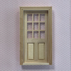 1:12 scale miniature unpainted wood 2 panel door with 9 pane window and frame, shown on a patterned background