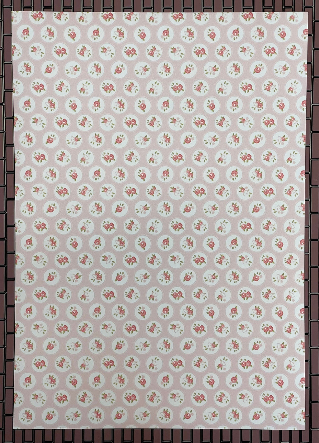 1:12 scale miniature rose and circle peel and stick wallpaper in red and cream, full sheet shown flat