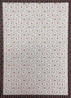 1:12 scale miniature rose and circle peel and stick wallpaper in red and cream, full sheet shown flat