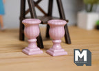 1:12 scale miniature pink Roman style pedestal urn planters with fluted bowls, set of 2, on a wood floor