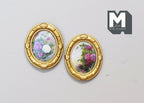 1:12 scale miniature flower vase paintings in oval gold frames, set of 2, shown on a white surface