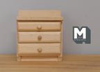 1:12 scale miniature unpainted wood nightstand with 3 drawers and round knobs, shown against a gray wall