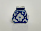 1:12 scale miniature clay flat pottery vase with blue pattern, blue and white, shown on a plain light background
