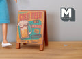1:12 scale miniature wood pub folding floor sign with cold beer mug illustration, shown standing on a wood floor