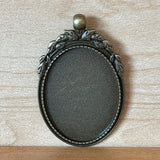 1:12 Metal Miniature Ornate Oval Bronze Picture Frame with Top Leaves and Ring - B054