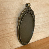 1:12 Metal Miniature Ornate Oval Bronze Picture Frame with Top Leaves and Ring - B054