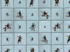 1:12 scale miniature Delft tile sheet with horsemen and hunters, 22 x 14 tiles, close view of pale blue gray tiles