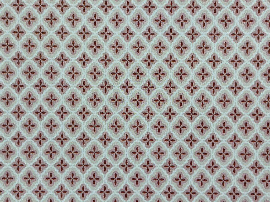 1:12 scale miniature red quatrefoil pattern wallpaper on white, with small red star motifs in a repeating lattice