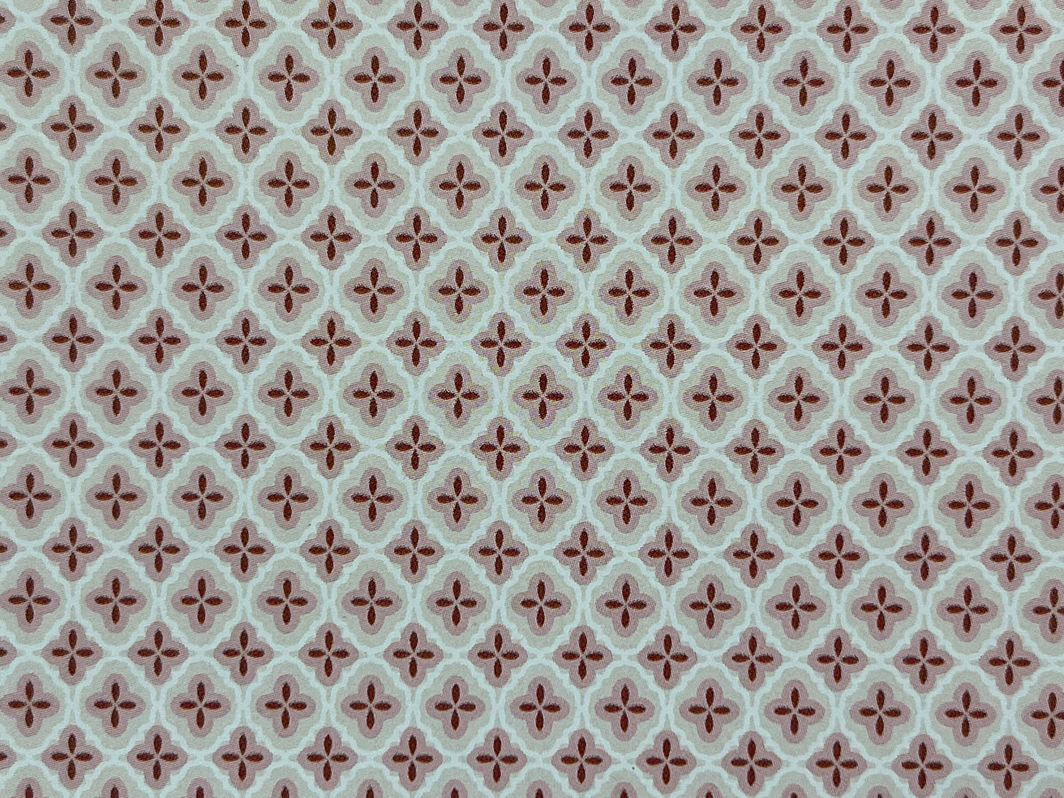 1:12 scale miniature red quatrefoil pattern wallpaper on white, with small red star motifs in a repeating lattice