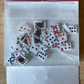 1:12 scale miniature playing cards, full deck with jokers, red and black suits, shown loose in a clear bag