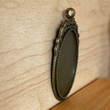 1:12 Metal Miniature Ornate Oval Bronze Picture Frame with Top Leaves and Ring - B054