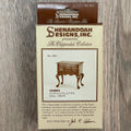 1:12 scale miniature wood Chippendale lowboy kit, shown in its retail box printed with the finished side table